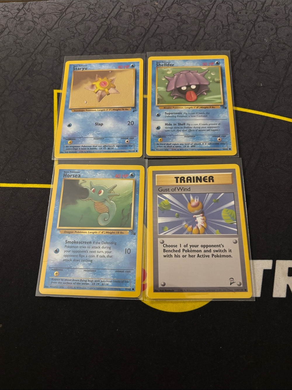 4 vintage Pokémon cards. 1999 wizards